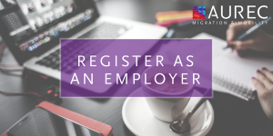 Register as an employer image with a neat desk background, coffee and laptop