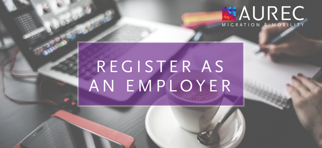 Register as an employer image with a neat desk background, coffee and laptop